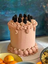 Load image into Gallery viewer, Vanilla bliss with blackberry coulis and white chocolate Swiss buttercream
